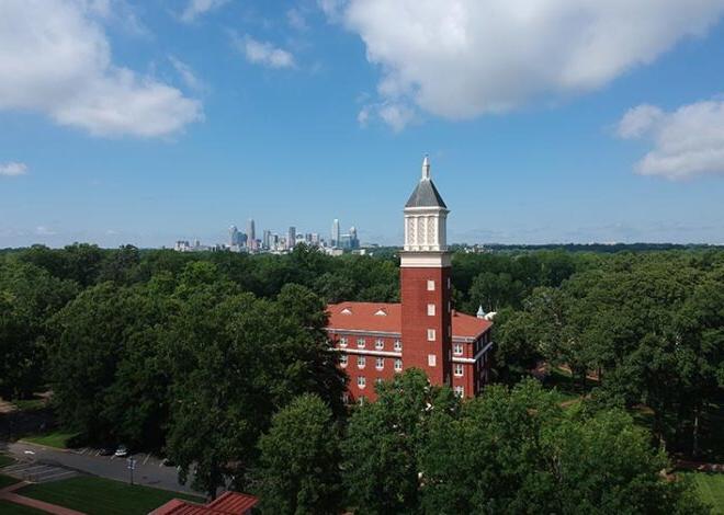 Aerial view of clocktower and Uptown skyline