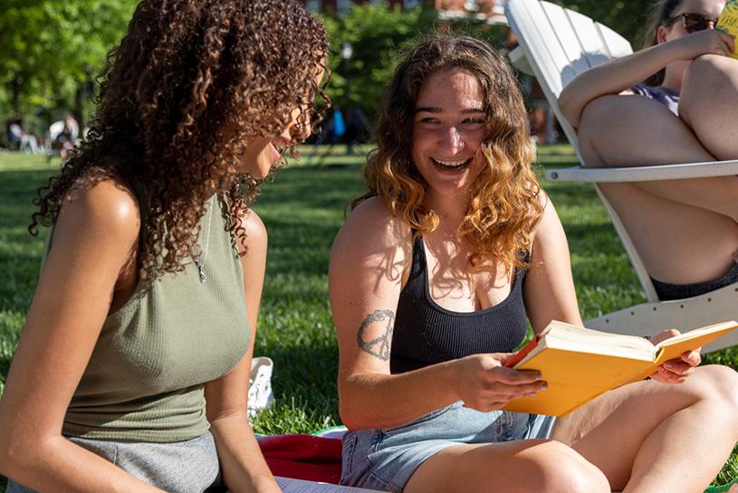 Students having book club in resident quad