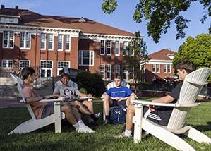 Students sitting in resident quad